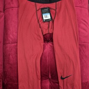 Nike Men's Red Joggers with Black Accents